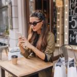 tired-shopaholic-woman-chilling-outdoor-cafe-autumn-day_197531-5719